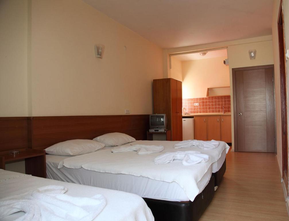 Tug Hotel คูซาดาซี ห้อง รูปภาพ