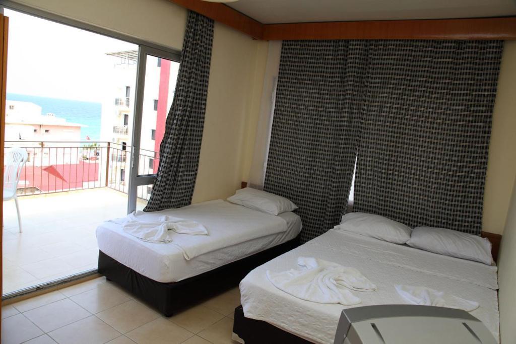 Tug Hotel คูซาดาซี ห้อง รูปภาพ