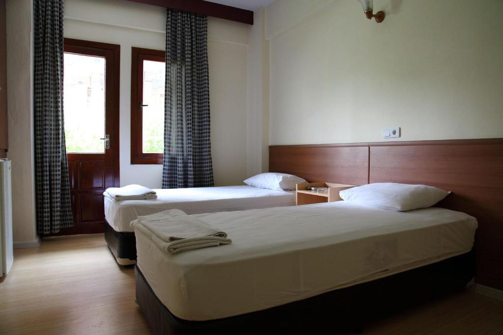 Tug Hotel คูซาดาซี ห้อง รูปภาพ